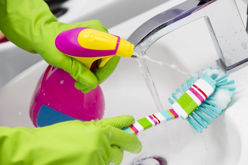 Cleaning team using safety procedures during a deep cleaning service