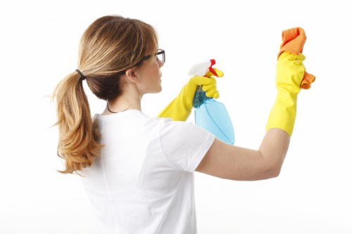 Staff member trained in safe cleaning methods and product handling